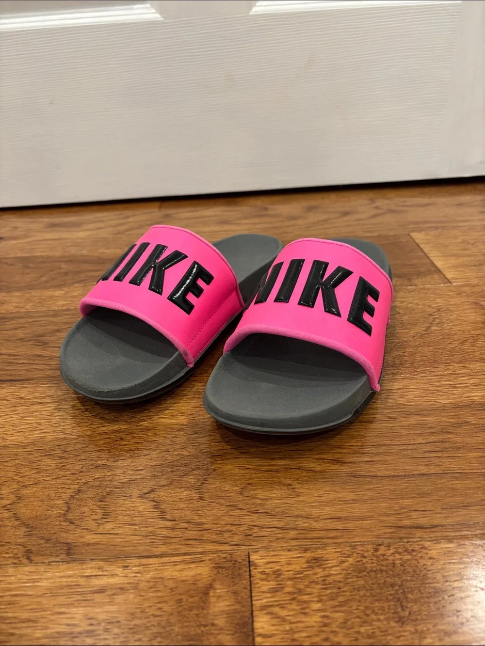 Nike Women’s Pink and Gray Slide Sandals with Bold Logo